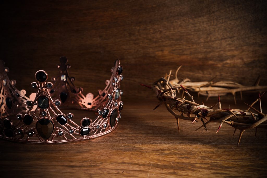 Crown Of Thorns with Crown Of on wooden background. The death and victory of Jesus Christ.