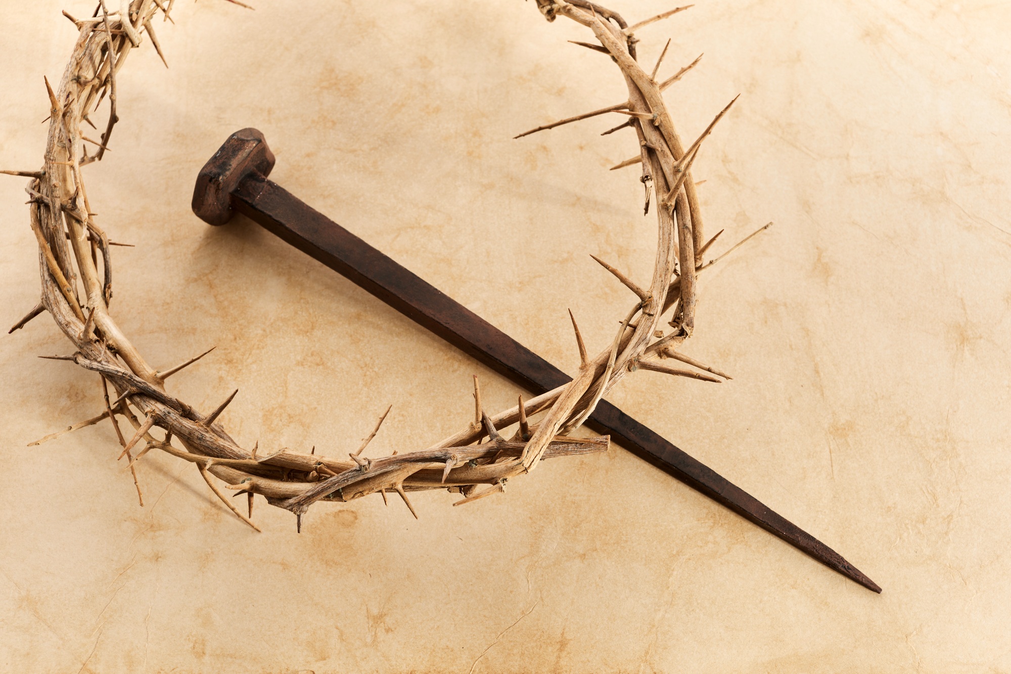 Jesus Crown Thorns and nail on Old and Grunge Background. Vintage Retro Style.