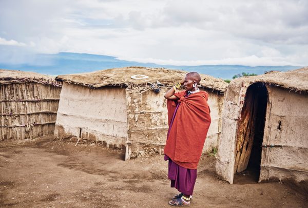Masai man in the village in Africa, Tanzania, Africa- 01 February 2020 Masai man in the village in Africa, Tanzania, Africa- 01 February 2020