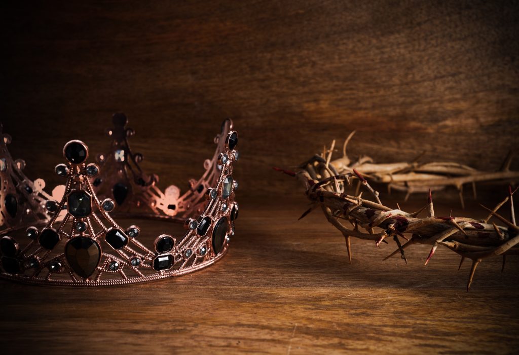 Crown Of Thorns with Crown Of on wooden background. The death and victory of Jesus Christ.